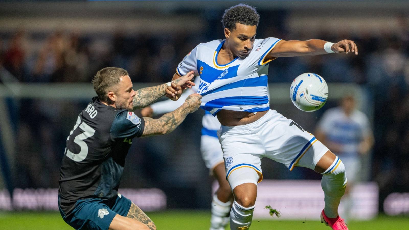 QPR goalscorer Alfie Lloyd, right, is grabbed by Derby County defender Joe Ward