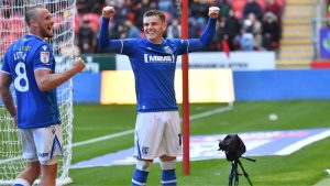 Ronan Hale, right, celebrates scoring his second for Gillingham.