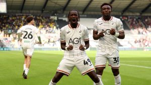 Swansea City’s Moussa Yeo, left, celebrates with Joseph Opoku after scoring the equaliser.