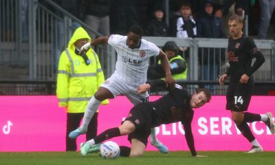 Bromley’s Victor Adeboyejo, left, attempts to evade a challenge