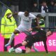 Bromley’s Victor Adeboyejo, left, attempts to evade a challenge