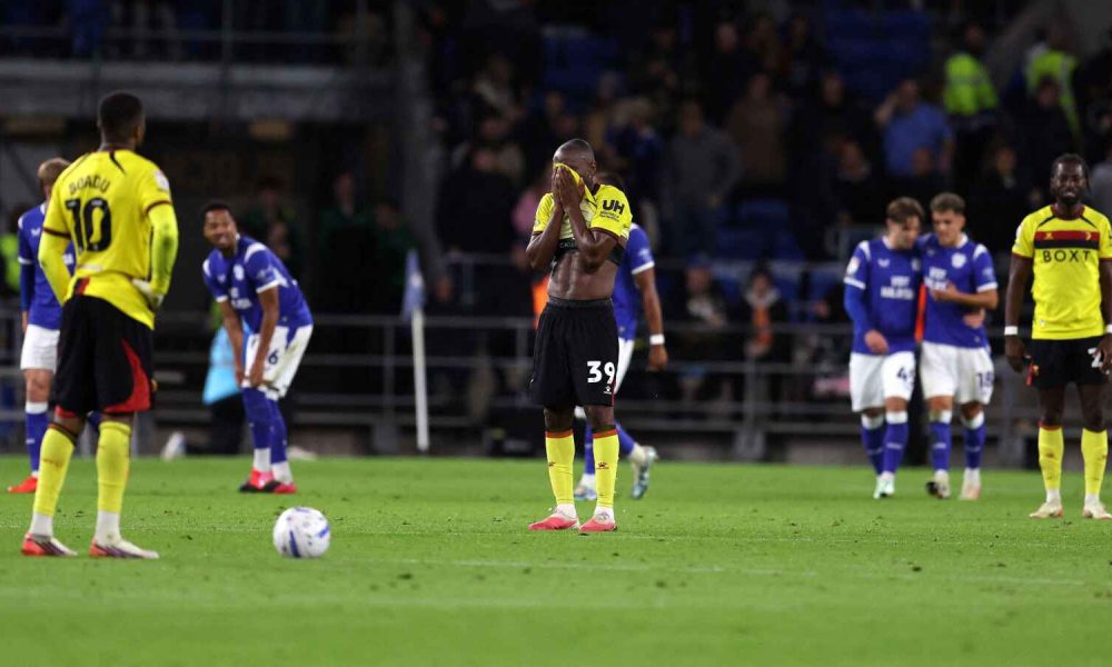 Watford players react after conceding a fourth goal in their 5-1 defeat to Cardiff City.