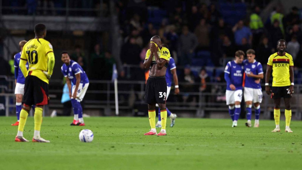 Watford players react after conceding a fourth goal in their 5-1 defeat to Cardiff City.