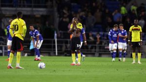 Watford players react after conceding a fourth goal in their 5-1 defeat to Cardiff City.