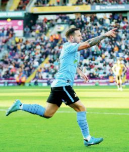 McCANN HAILS