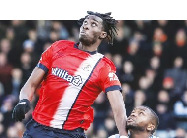 HIGH RISE: Luton’s Elijah Adebayo leaps for the ball PICTURES: George Dunn