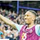 TAKE THE ACCLAIM: Jaidon Anthony celebrates scoring Burnley’s second and, inset, boss Scott Parker salutes the fans PICTURES: Alamy