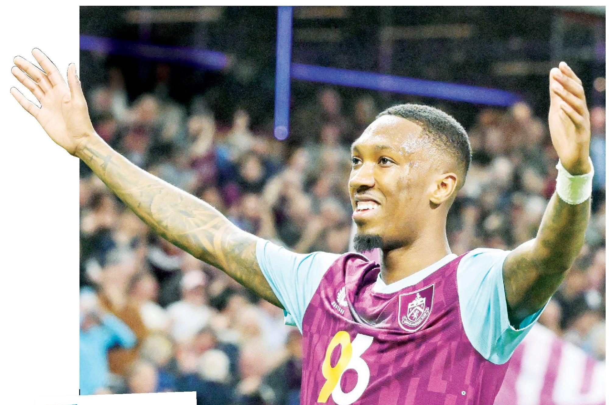 TAKE THE ACCLAIM: Jaidon Anthony celebrates scoring Burnley’s second and, inset, boss Scott Parker salutes the fans PICTURES: Alamy