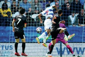 HEAD MASTER: Karamoko Dembele puts QPR ahead PICTURES: Alamy and PSI/ Paul Bocking