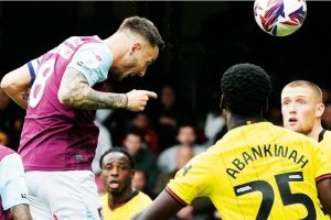 HEAD MASTER: Burnley’s Josh Brownhill rises to score the winner PICTURE: Alamy