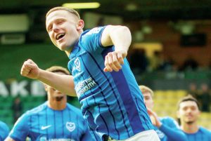 HERO: Portsmouth’s Colby Bishop celebrates their triumph with the supporters PICTURES: Alamy