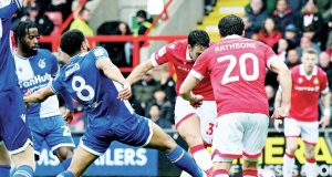 TO THE RESCUE: Matty James fires home Wrexham’s leveller PICTURES: Alamy