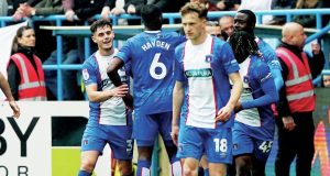 GOOD SHOUT: Carlisle’s Georgie Kelly, far left, celebrates scoring the opener PICTURES: Alamy