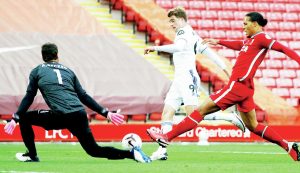 HEYDAY: Patrick Bamford scores for Leeds against Liverpool in the Premier League in 2020 PICTURE: Alamy
