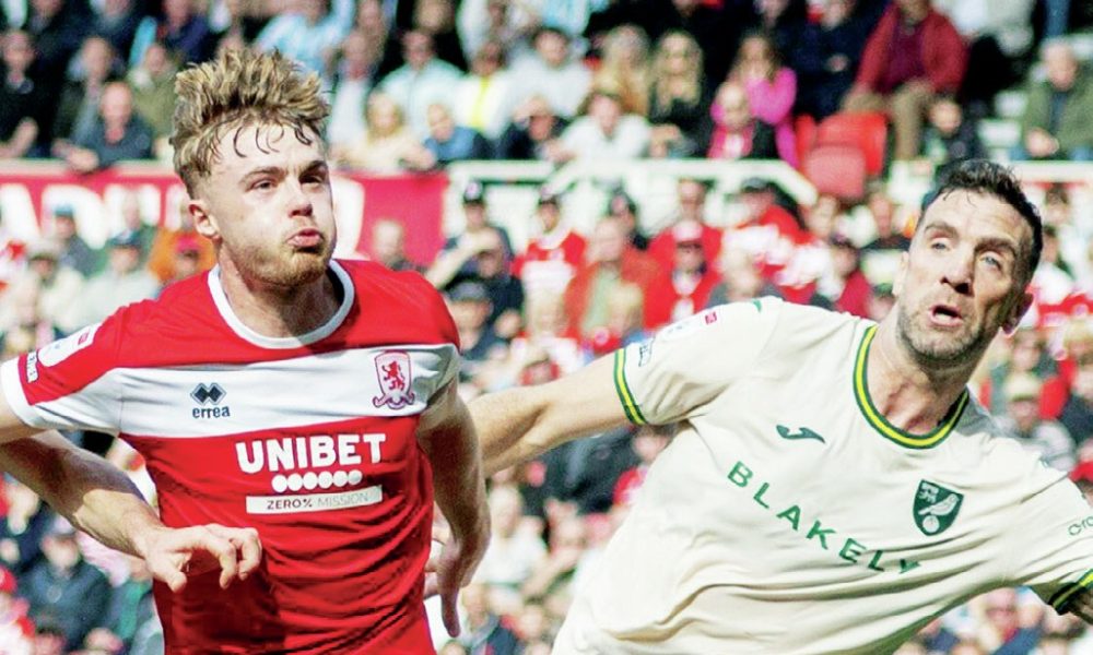 EYES FORWARD: Middlesbrough’s Tommy Conway battles for the ball with Norwich City’s Shane Duffy PICTURES: MI News & Sport