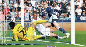 GORGEOUS GEORGE: Millwall’s George Saville forces the ball over the line to put his side into the lead PICTURES: Focus Images