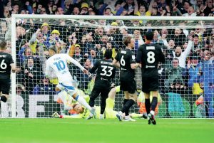 HERE WE GO: Joel Piroe wheels away after scoring Leeds’ opener against Stoke PICTURE: Alamy