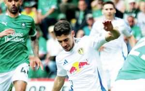 TITLE-WINNER: Leeds United’s Manor Solomon scores their precious winner against Plymouth PICTURE: Alamy
