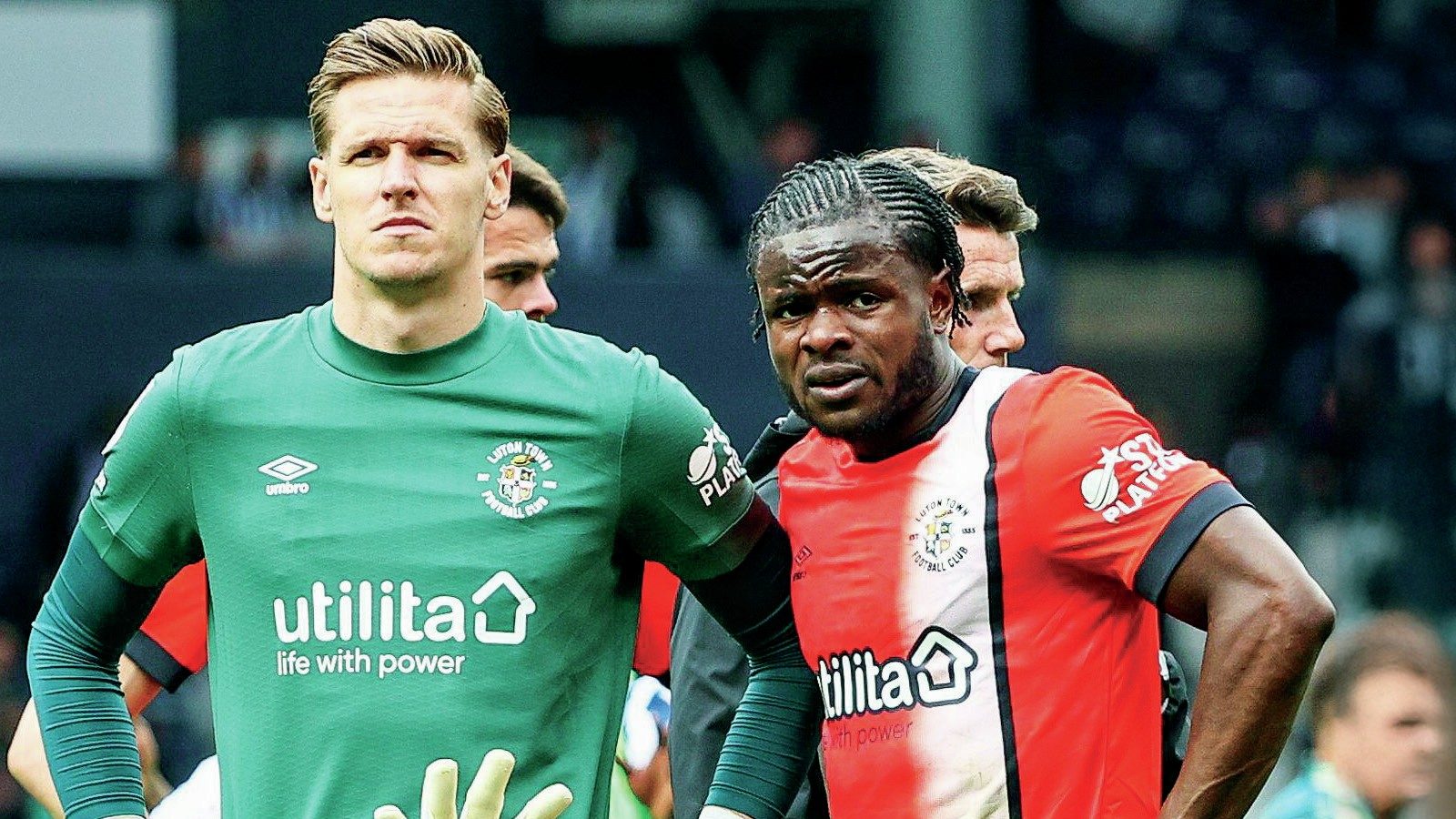 PAIN GAME: Luton goalkeeper Thomas Kaminski and forward Millenic Alli can’t hide their disappointment at the final whistle PICTURES: Alamy