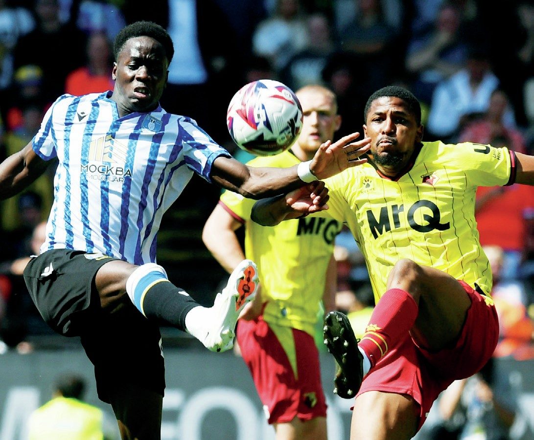 ON THE STRETCH: The Owls’ Djeidi Gassama, left, and Watford’s Yasser Larouci fight for the ball PICTURES: Alan Cozzi