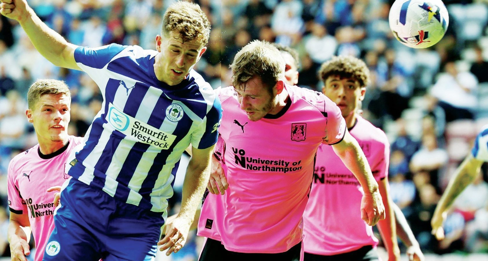 HEAD MASTER: Wigan’s Jensen Weir scores their second goal PICTURES: Alamy