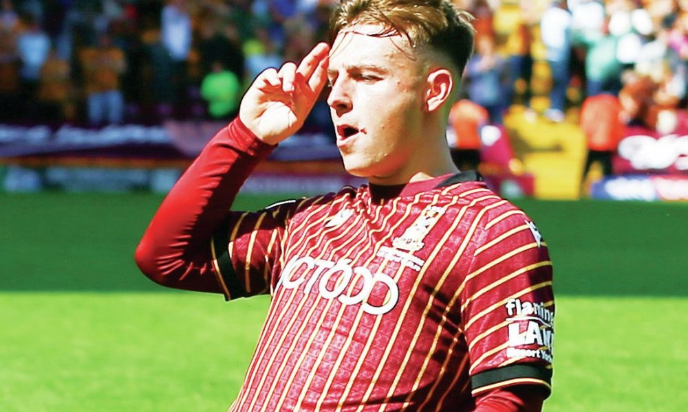 KNEESY DOES IT: Bobby Pointon celebrates his goal to double Bradford City’s lead PICTURES: Alamy