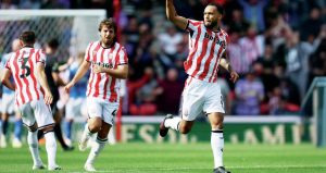 GAME ON: Stoke City’s Lewis Baker, right, celebrates scoring their leveller PICTURE: Alamy
