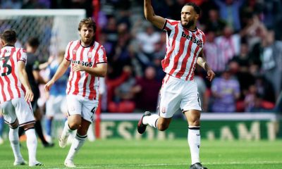 GAME ON: Stoke City’s Lewis Baker, right, celebrates scoring their leveller PICTURE: Alamy