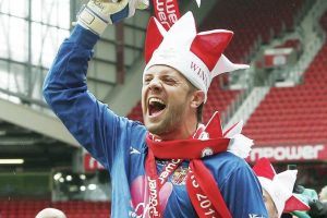 TOP SIGNING: Stevenage keeper Chris Day celebrates promotion to League One in 2011 PICTURE: Alamy