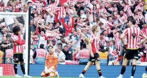 Sheffield United players in despair as Sunderland fans savour their last-gasp winner