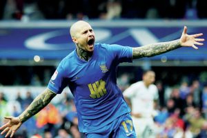 Lyndon Dykes savours his winner for the Blues
