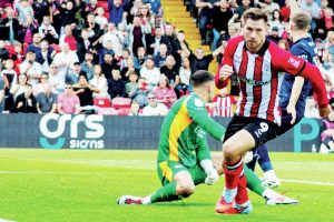 Lincoln’s James Collins can’t wait to face Chelsea