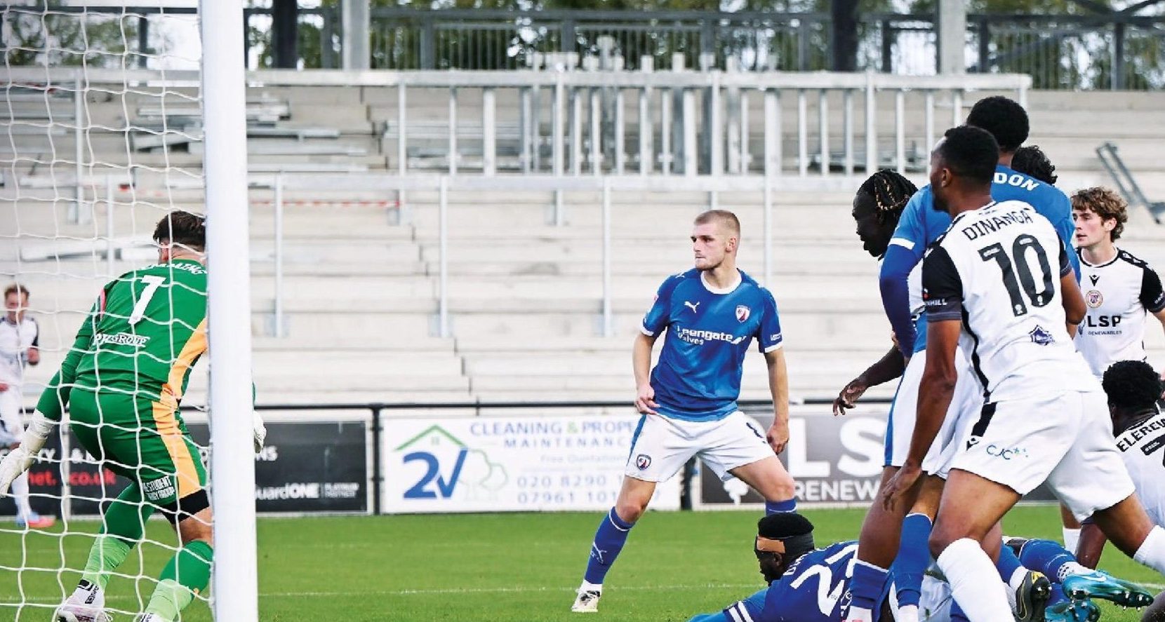 Chesterfield’s Chey Dunkley scores an own goal under pressure from Bromley’s Deji Elerewe