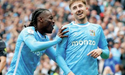Coventry City’s Brandon Thomas-Asante, left, pushes Josh Eccles forward after his part in the second goal