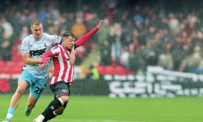 AT CLOSE QUARTERS: Charlton’s James Bree, left, gets to grips with Sheffield United’s Gustavo Hamer last weekend PICTURE: Alamy