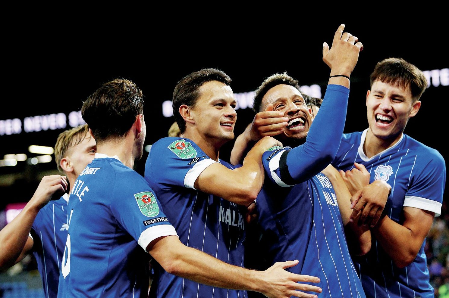 Callum Robinson, second from right, celebrates scoring Cardiff City’s second at Burnley