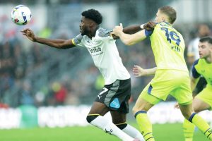 Derby’s Patrick Agyemang, left, grapples with Preston’s Lewis Gibson last weekend