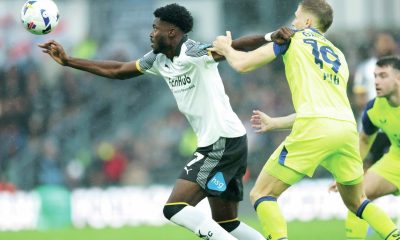 Derby’s Patrick Agyemang, left, grapples with Preston’s Lewis Gibson last weekend