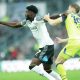 Derby’s Patrick Agyemang, left, grapples with Preston’s Lewis Gibson last weekend