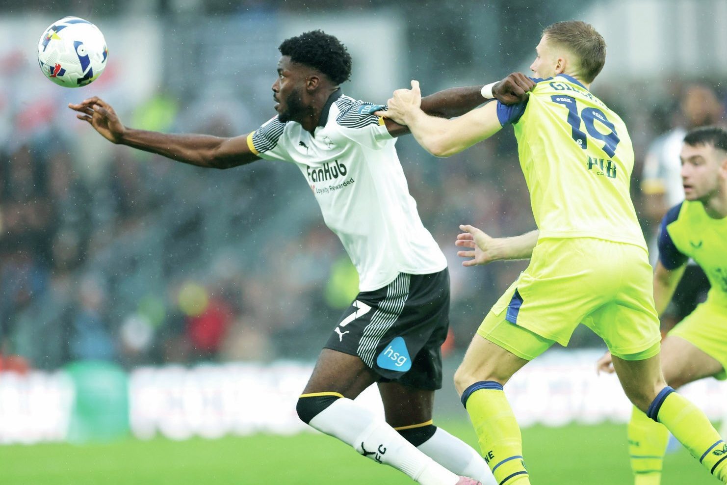 Derby’s Patrick Agyemang, left, grapples with Preston’s Lewis Gibson last weekend