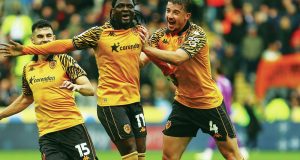 Hull City’s David Akintola, centre, celebrates his first half winner against the Blades