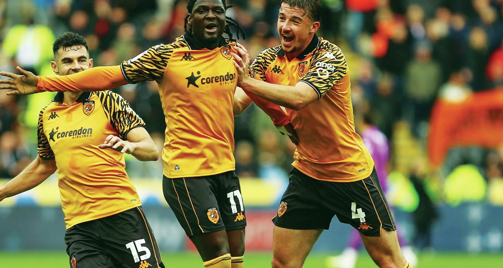 Hull City’s David Akintola, centre, celebrates his first half winner against the Blades