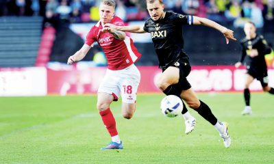 Oxford United’s Michal Helik, right, battles for the ball with Bristol City’s Emil Riis in his side’s 3-1 win