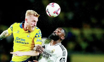 Oli McBurnie in action for Las Palmas – beating Real Madrid’s Antonio Rudiger in the air