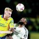 Oli McBurnie in action for Las Palmas – beating Real Madrid’s Antonio Rudiger in the air