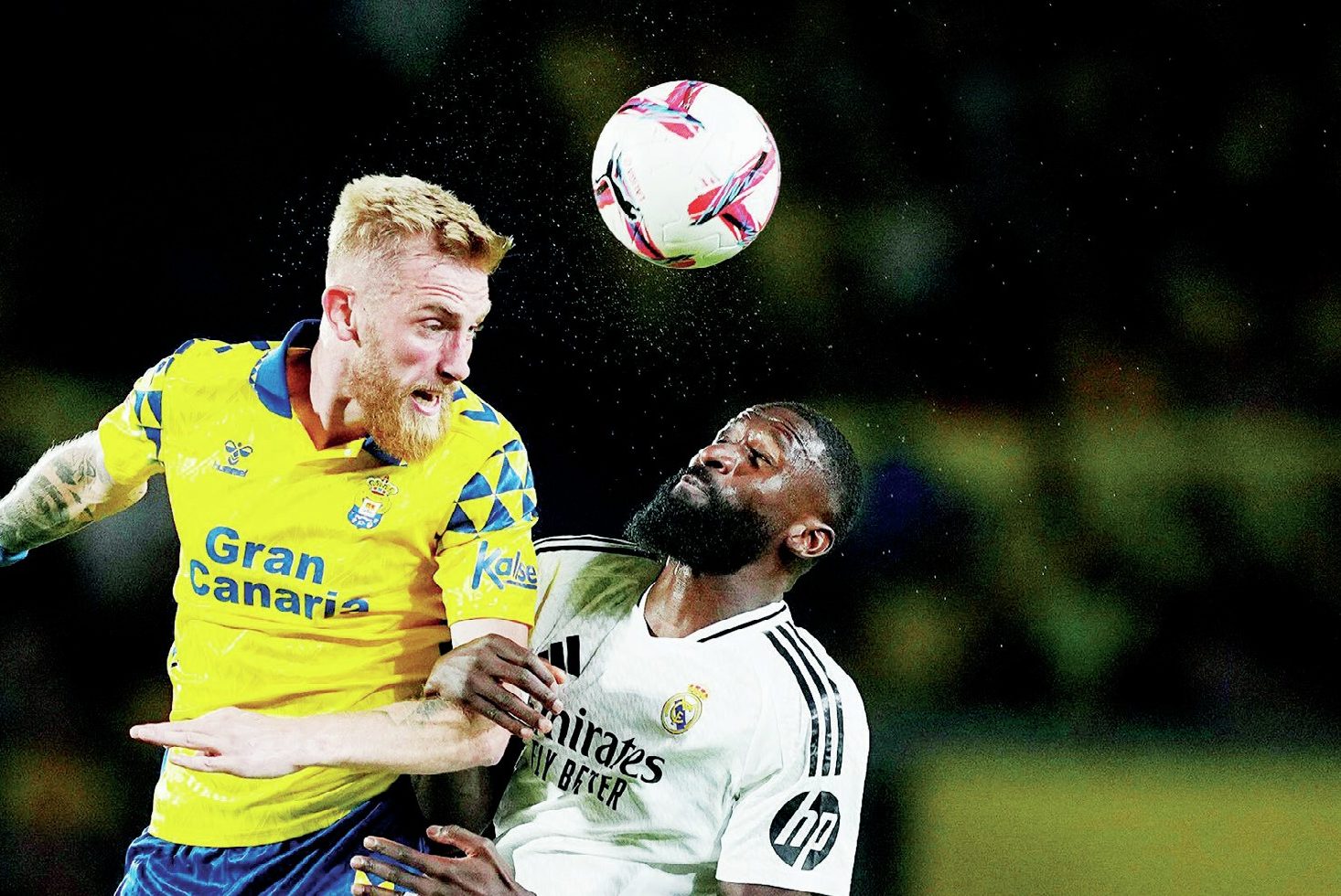 Oli McBurnie in action for Las Palmas – beating Real Madrid’s Antonio Rudiger in the air