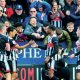 Grimsby Town players and fans enjoy their second goal