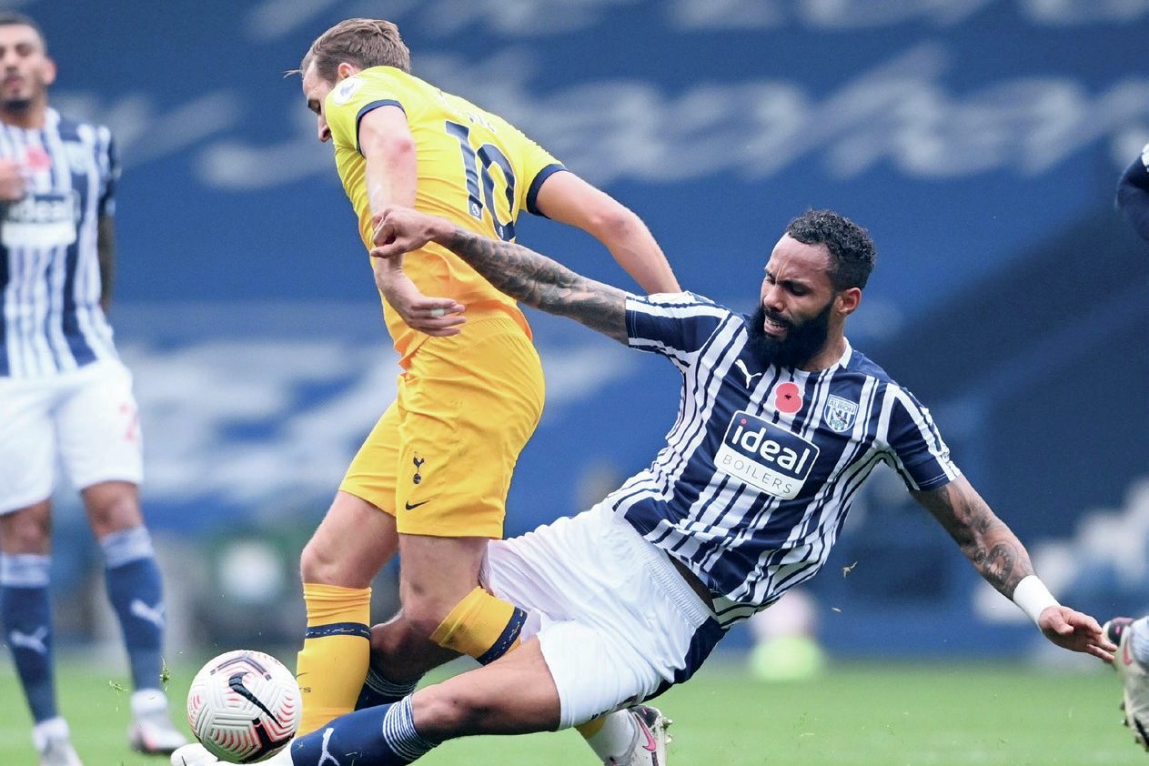 West Brom’s Kyle Bartley tackles Tottenham’s Harry Kane