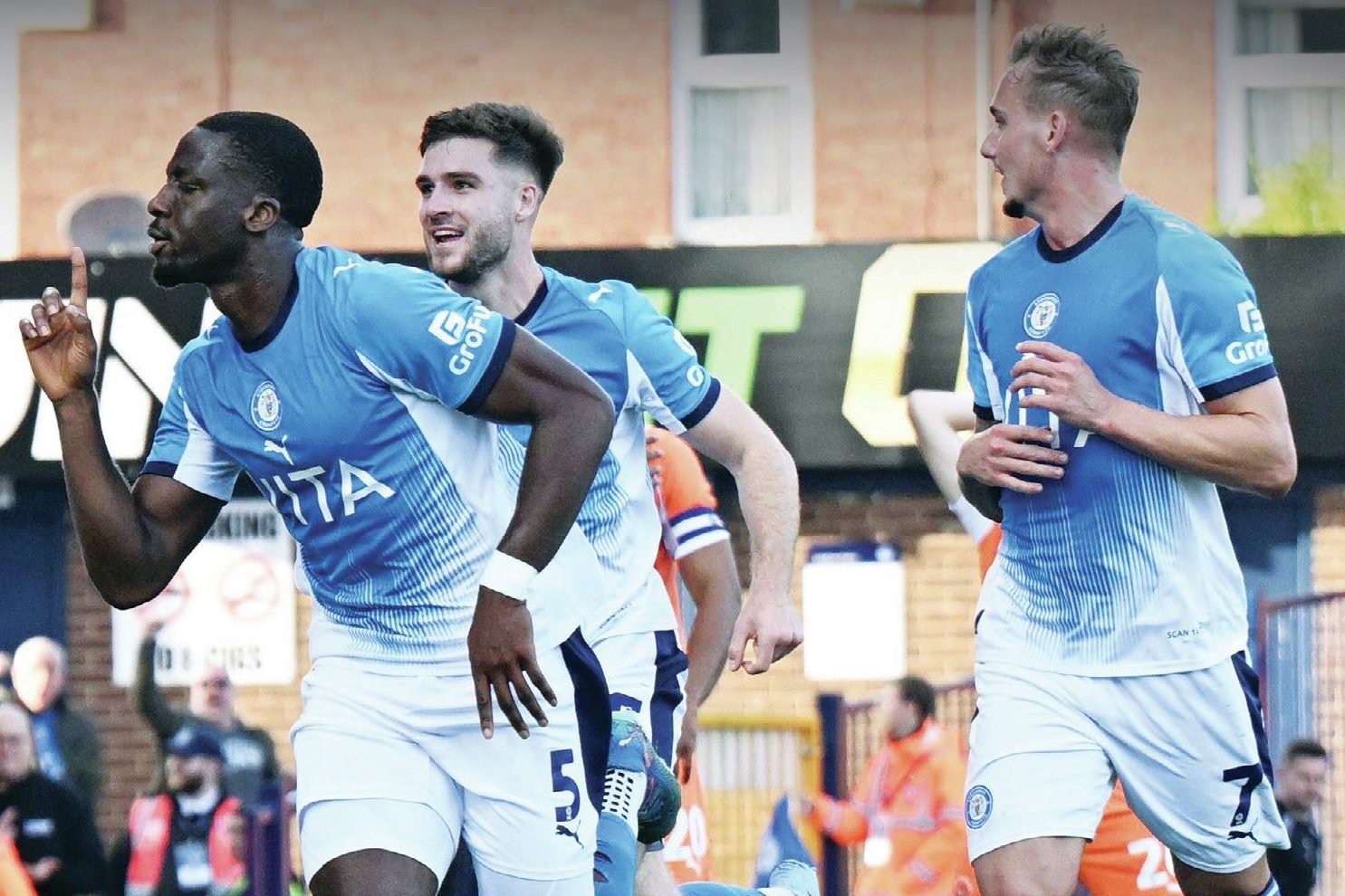 Joseph Olowu celebrates his winner for the Hatters