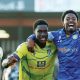 Micah Mbick, left, and Kyreece Lisbie celebrate after Colchester’s win